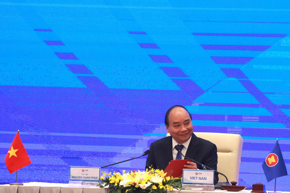 Vietnamese Prime Minister Nguyen Xuan Phuc delivers a remark after the signing ceremony of the Regional Comprehensive Economic Partnership, or RCEP, trade agreement in Hanoi, Vietnam on Sunday, Nov. 15, 2020. China and 14 other countries agreed Sunday to set up the world’s largest trading bloc, encompassing nearly a third of all economic activity, in a deal many in Asia are hoping will help hasten a recovery from the shocks of the pandemic.(AP Photo/Hau Dinh)