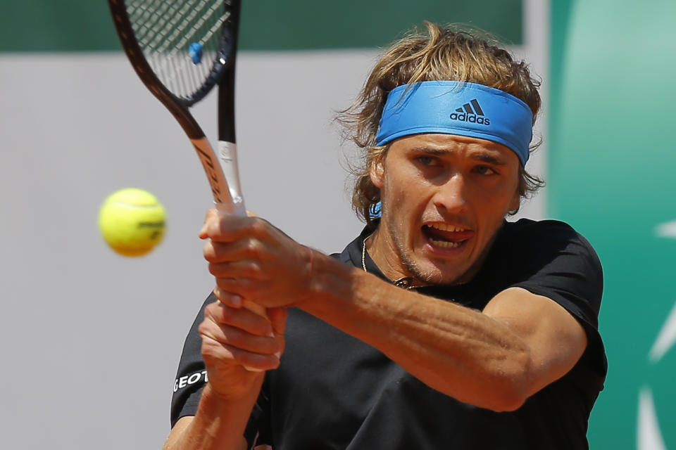 Germany's Alexander Zverev plays a shot against Serbia's Novak Djokovic during their quarterfinal match of the French Open tennis tournament at the Roland Garros stadium in Paris, Thursday, June 6, 2019. (AP Photo/Michel Euler)