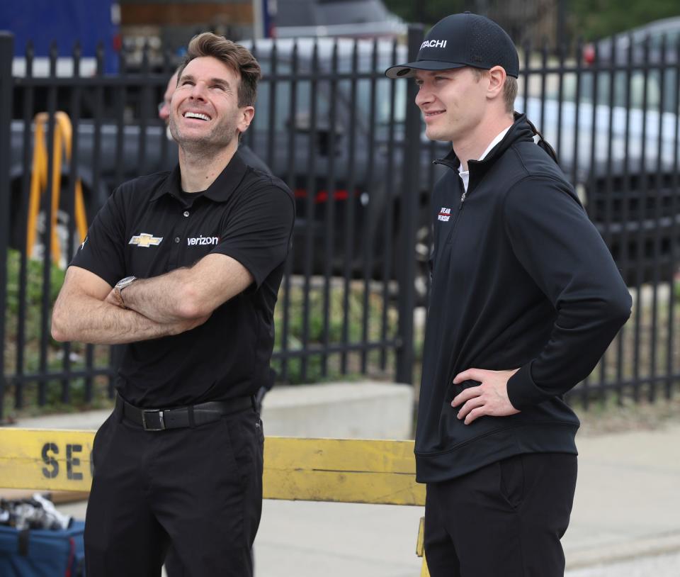 IndyCar drivers Will Power, left, and Josef Newgarden attend the ceremony in downtown Detroit for the new course for the Detroit Grand Prix on Monday, June 6, 2022.