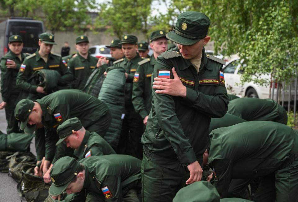 Russian conscripts called up for military service prepare to depart for garrisons from a recruitment center in Russia's Rostov region on May 16, 2024.