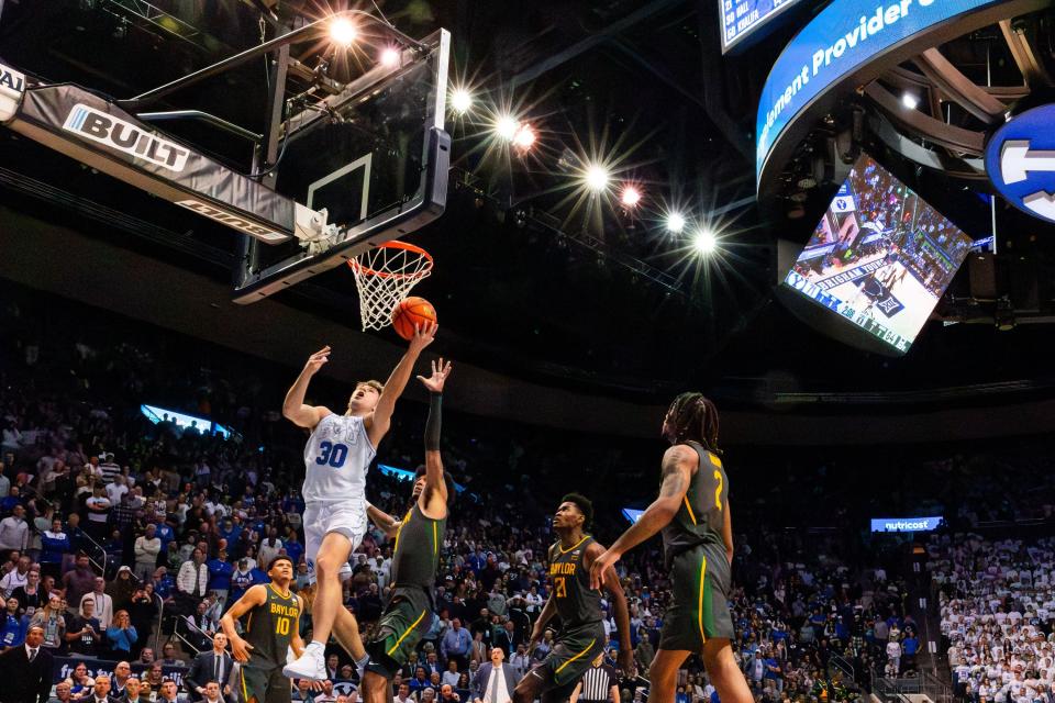 Brigham Young Cougars guard Dallin Hall (30) shoots a layup during a men’s college basketball game between Brigham Young University and Baylor University at the Marriott Center in Provo on Tuesday, Feb. 20, 2024. | Megan Nielsen, Deseret News