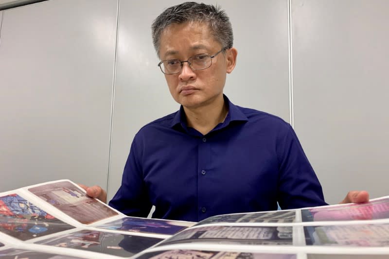 Former Hong Kong student leader Chan poses for the camera in Hong Kong