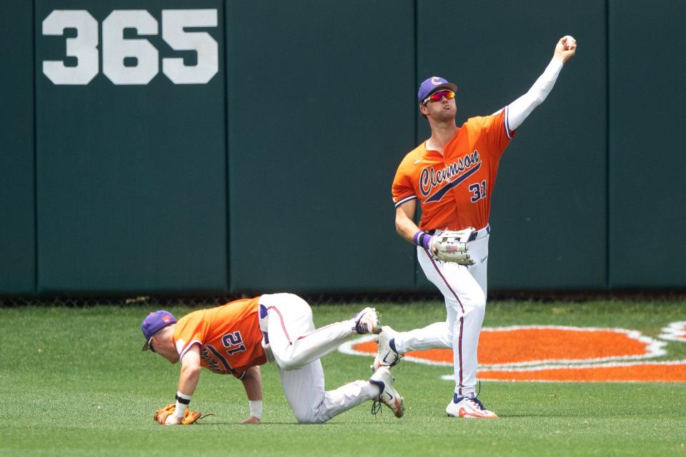 Clemson's Caden Grice (31) throws to the infield during a NCAA baseball regional game between Clemson and Charlotte held at Doug Kingsmore Stadium in Clemson, S.C., on Sunday, June 4, 2023. 