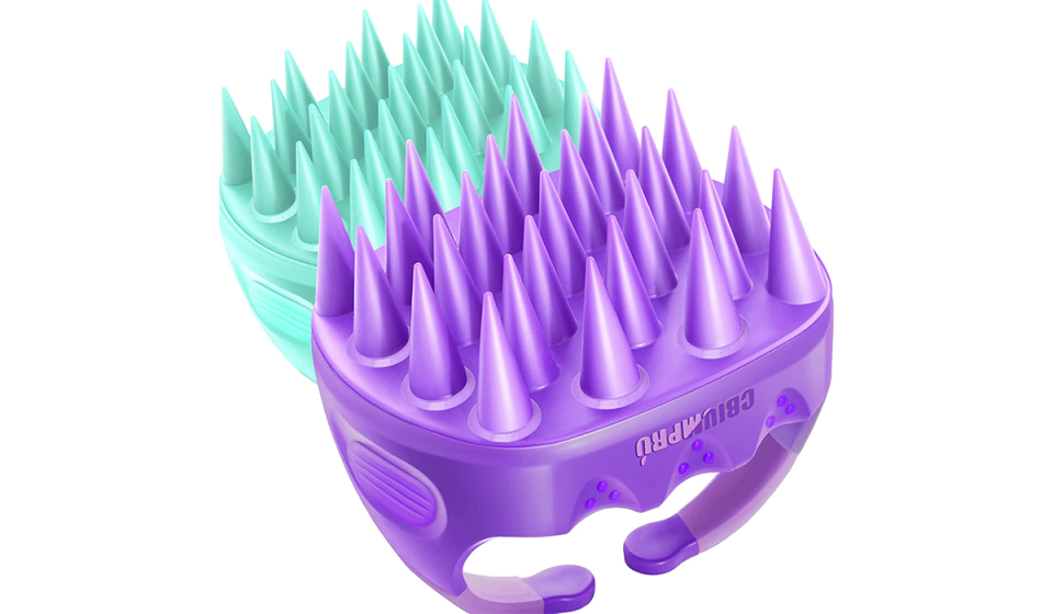 Handheld purple and teal silicone spiked scalp massager