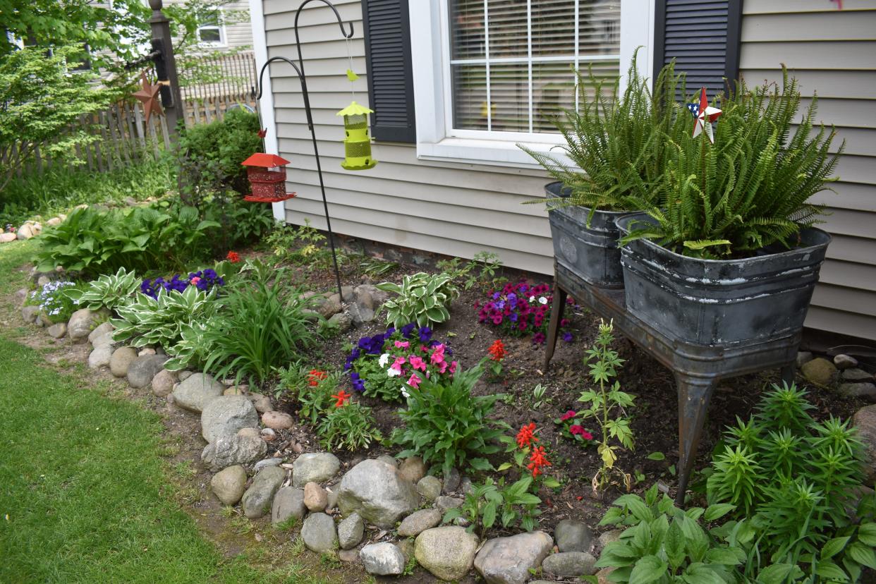 The home garden of Adrian’s Kim Baumea, 158 Budlong St., has been recognized as the Garden of the Month for May by the Adrian Women’s Garden Club. It is the first home garden to receive the monthly recognition for the garden club’s 2023 season.