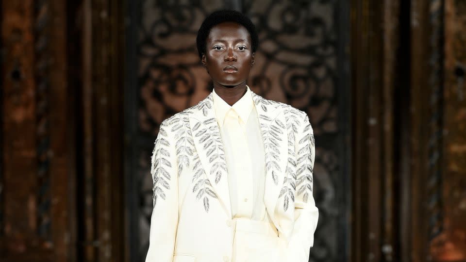 Naeem Kahn’s first collection was inspired by Sicilian Baroque architecture and included breezy suits in addition to his signature glittering dresses. - Fernanda Calfat/Getty Images