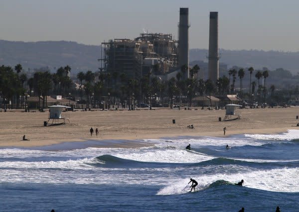 The gas-fired power plant in Huntington Beach is owned by AES Corp.