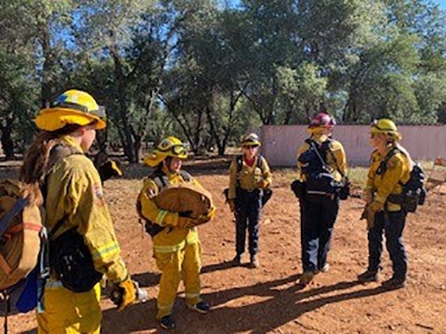 Camp Cinder attendees learn correct use of firefighting equipment. Girls ages 14 to18 arrived at Shasta College in Redding on Monday to attend the week-long Cal Fire sponsored camp.