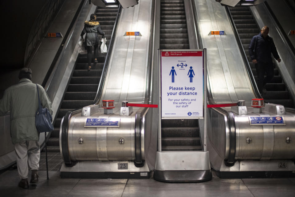 A social distancing information board at Waterloo tube station on the London Underground during what would normally be the evening rush hour, as the UK continues in lockdown to help curb the spread of the coronavirus.