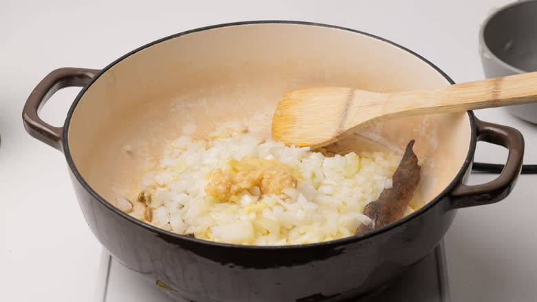 pan frying onions and spices