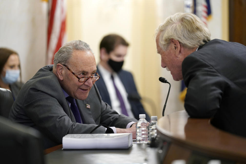 Senate Majority Leader Chuck Schumer of N.Y., and Sen. Angus King, I-Maine, speak before a Senate Rules Committee hearing at the Capitol in Washington, Tuesday, May 11, 2021. (AP Photo/J. Scott Applewhite)