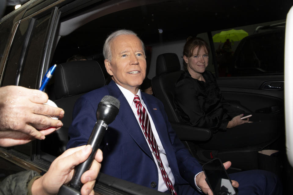 FILE - In this April 26, 2019 file photo, former Vice President and Democratic presidential candidate Joe Biden rides in a car after appearing on ABC's "The View" in New York. On Friday, May 29, 2020, The Associated Press reported on a video circulating online appearing to show the presumptive Democratic presidential candidate on “The View” avoiding a question about inappropriate touching. The video, taken from Biden’s April 26, 2019, appearance on the daytime talk show was edited to make it appear he failed to give a direct answer to the question about inappropriate touching and stumbled through the response. (AP Photo/Eduardo Munoz Alvarez)