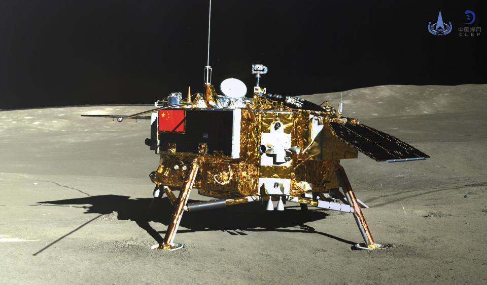 FILE - This photo provided on Jan. 12, 2019, by the China National Space Administration via Xinhua News Agency shows the lunar lander of the Chang'e-4 probe in a photo taken by the rover Yutu-2 on Jan. 11. China is preparing to launch a lunar probe Friday, May 3, 2024, that would land on the far side of the moon and return with samples that could provide insights into geological and other differences between the less-explored region and the better-known near side. (China National Space Administration/Xinhua News Agency via AP, File)