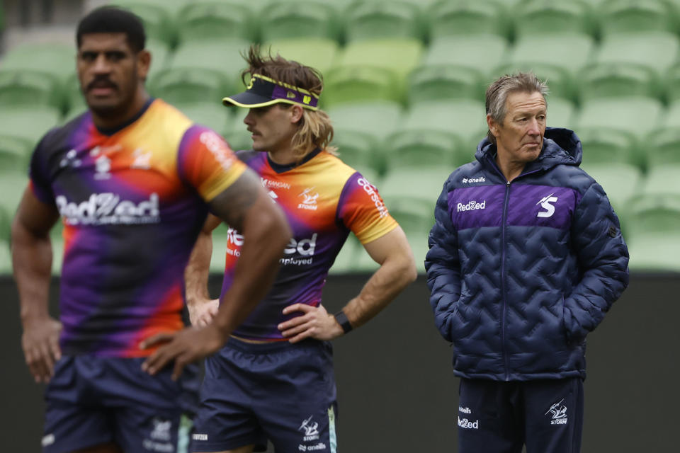 Craig Bellamy watches on during training.