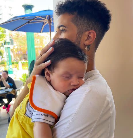 jordan fisher/instagram Jordan Fisher cradles his son Riley in a photo shared on Instagram.