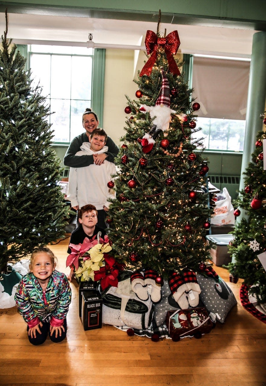 Kristin Lee Maclaughlan and her three children decorated a tree in her mother’s honor at this year's Festival of Trees.
