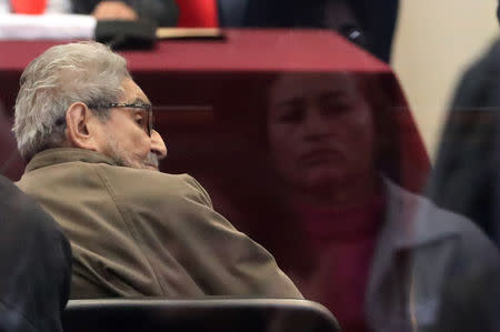 Shining Path founder Abimael Guzman attends a trial during sentence of a 1992 Shining Path car bomb case in Miraflores, at a high security naval prison in Callao, Peru September 11, 2018. REUTERS/Mariana Bazo
