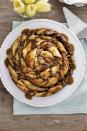 <p>If Dad's got a sweet tooth, wake him up this with deliciously decadent caramel-pecan roll. (You might want to make two, since he'll probably want seconds.)</p><p><strong><a href="https://www.countryliving.com/food-drinks/recipes/a35036/twisted-sticky-caramel-pecan-roll/" rel="nofollow noopener" target="_blank" data-ylk="slk:Get the recipe for Twisted Sticky Caramel-Pecan Roll" class="link ">Get the recipe for Twisted Sticky Caramel-Pecan Roll</a>.</strong></p>