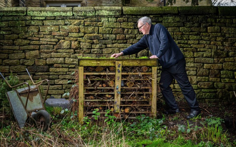 Eric Igo helps the wildlife on the church grounds