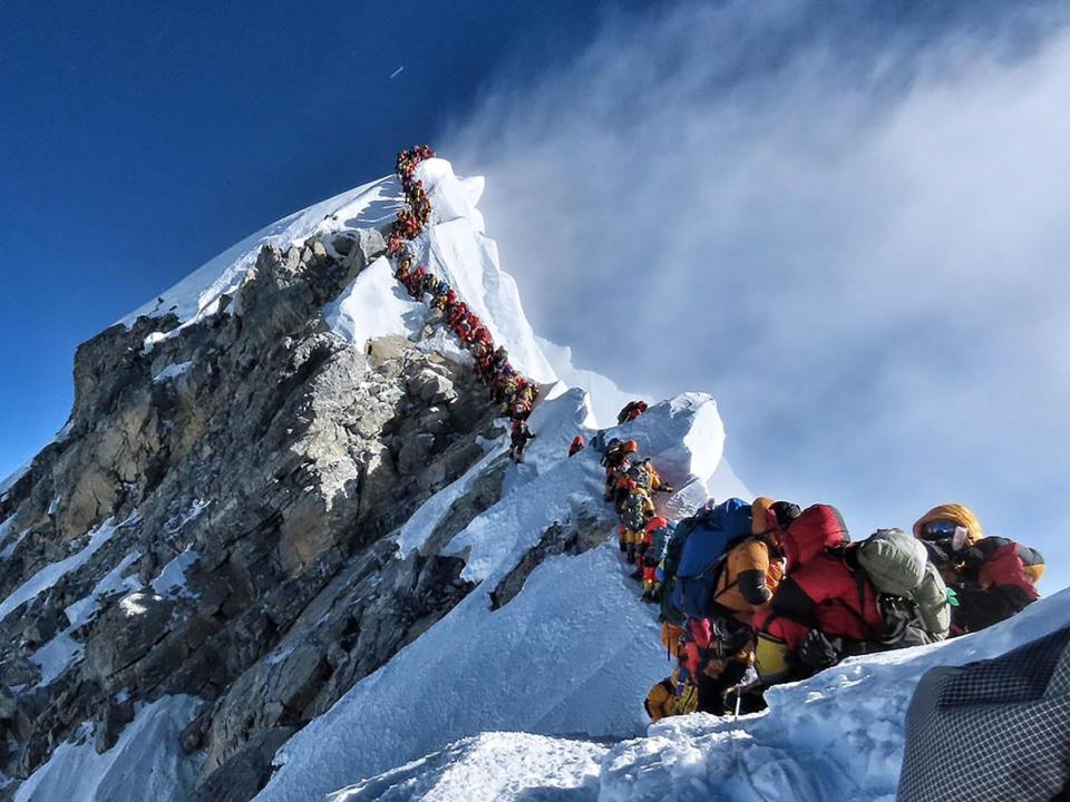 Climbers have been stuck in a “traffic jam” near the summit of Mount Everest after two climbers died near the summit.Over 200 mountaineers were climbing the world’s highest mountain from Nepal and China, but had to line up on their way for more than two hours, the Himalayan Times reported.An American and Indian were among the latest fatalities on the 8,848m mountain.Donald Lynn Cash, 55, collapsed near the summit as he was taking photos, the Agence France-Presse news agency reported.Anjali Kulkarni, 54, died after falling ill while descending the summit, according to the Himalayan Times.Four people have died while climbing Everest so far this season.An Indian climber died last week and an Irish mountaineer is presumed dead after slipping and falling close to the summit.It comes after a Sherpa mountaineer extended his record for the number of successful climbs of Mount Everest to 24.Kami Rita climbed to the top on 15 May then returned to base camp, before climbing it again.There are 41 teams with a total of 378 climbers permitted to scale Everest during the spring climbing season. An equal number of Nepalese guides are helping them to get to the summit.Only a few windows of good weather each May allow climbers the best chance of climbing to the summit.