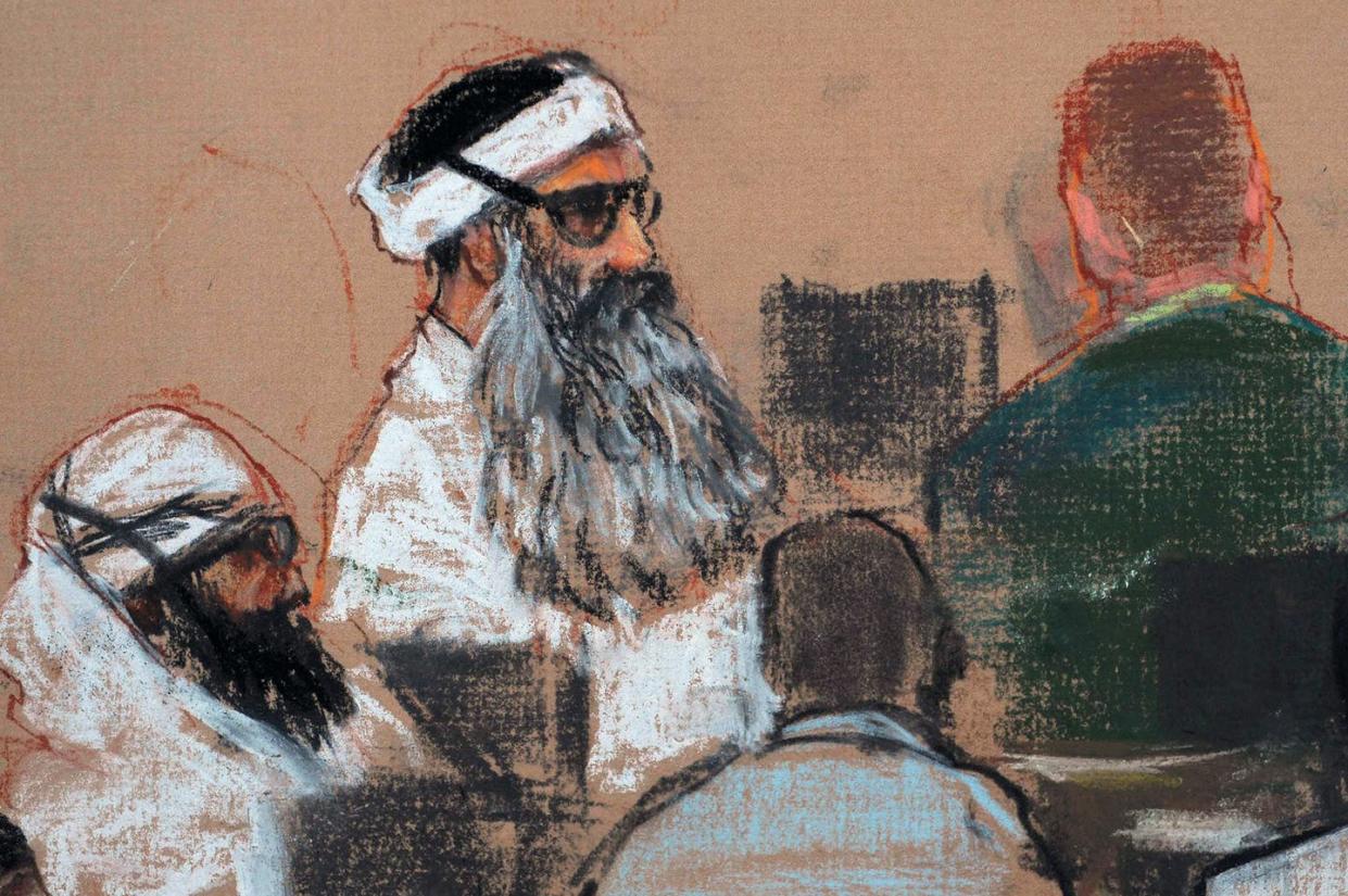 <span class="caption">Khalid Sheikh Mohammed and co-defendants return to court in November.</span> <span class="attribution"><a class="link " href="https://newsroom.ap.org/detail/Sept11WhereAreTheyNow/6c9f5ca01f284537ab17763897a37847/photo?Query=trial%20AND%20guantanamo&mediaType=photo&sortBy=arrivaldatetime:desc&dateRange=Anytime&totalCount=170&currentItemNo=0" rel="nofollow noopener" target="_blank" data-ylk="slk:AP Photo/Janet Hamlin;elm:context_link;itc:0;sec:content-canvas">AP Photo/Janet Hamlin</a></span>