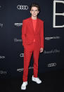 <p>At the “Beautiful Boy” premiere in Los Angeles on October 8, Timothée paired a block colour Louis Vuitton suit with retro inspired trainers, also by the French fashion house. <em>[Photo: Getty]</em> </p>
