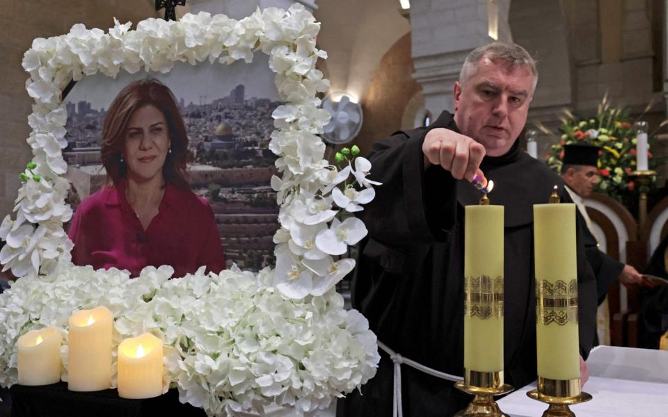 A mass held for Shireen Abu Akleh at the Church of the Nativity in the West Bank city of Bethlehem - Hazem Bader/AFP