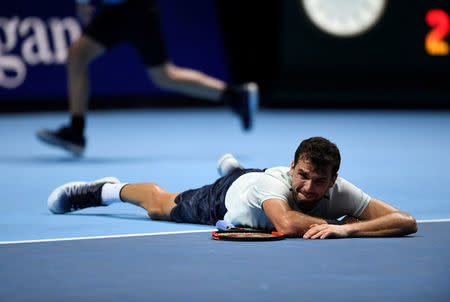 Tennis - ATP World Tour Finals - The O2 Arena, London, Britain - November 19, 2017 Bulgaria's Grigor Dimitrov celebrates after winning the final against Belgium's David Goffin Action Images via Reuters/Tony O'Brien