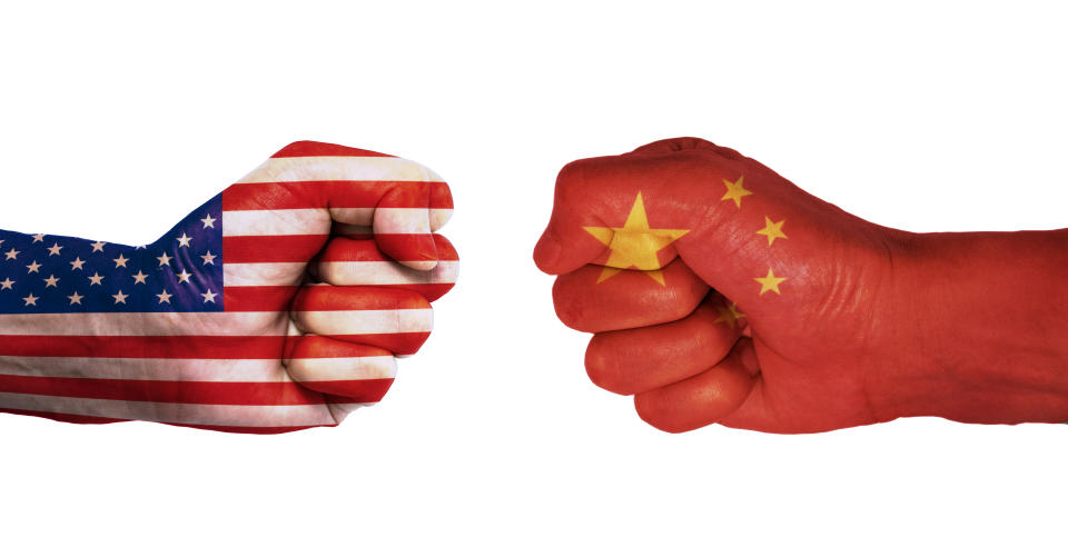 Conflict between USA and China, male fists - governments conflict concept