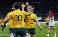 France Rugby - France v Australia - Stade de France, Saint-Denis near Paris, France, 19/11/2016. Australia's Bernard Foley (C) celebrates with team mates after scoring a try during his match against France. REUTERS/Benoit Tessier