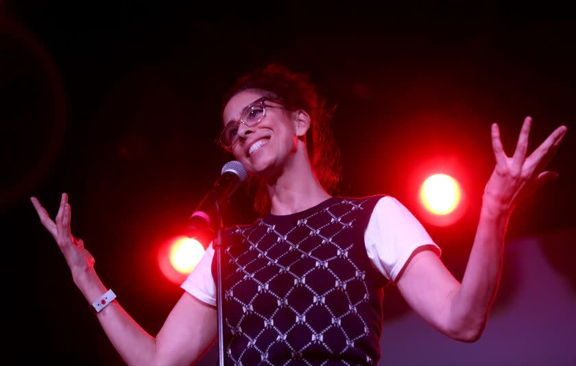 Comedian Sarah Silverman tries out new jokes prior to a Pussy Riot concert at El Rey Theater in Los Angeles on Wednesday, Aug. 10, 2022. Silverman came out wearing a Pussy Riot balaclava (face mask) and did a 15-minute routine.