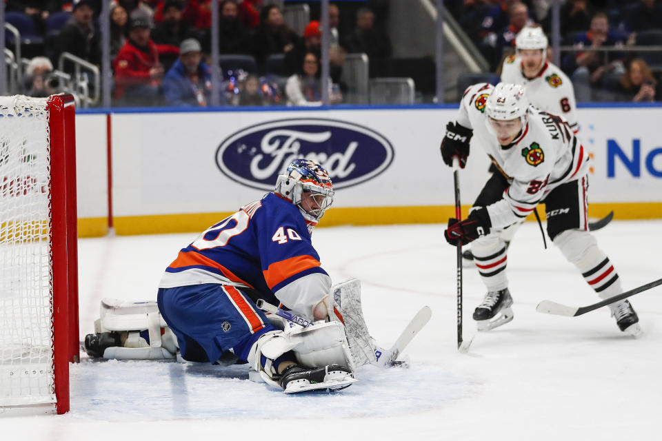 New York Islanders goaltender Semyon Varlamov (40) makes a save against the Chicago Blackhawks during the first period of an NHL hockey game on Sunday, Dec. 4, 2022, in Elmont, N.Y. (AP Photo/Eduardo Munoz Alvarez)