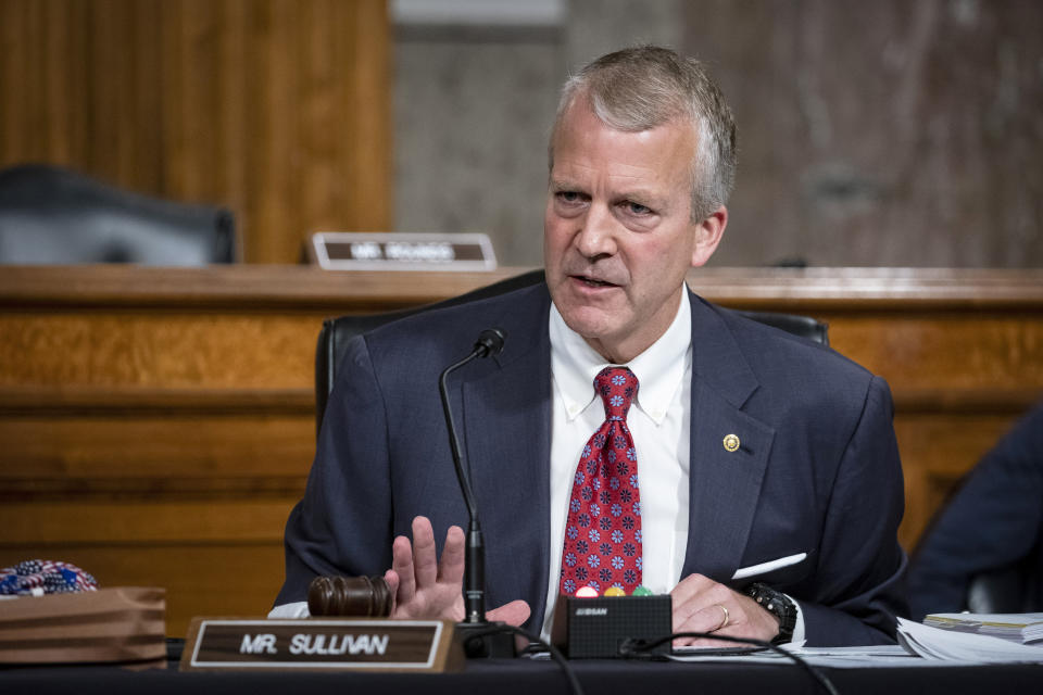 FILE - In this May 7, 2020, file photo, Sen. Dan Sullivan, R-Alaska, testifies during a hearing on Capitol Hill in Washington. Republican U.S. Sen. Dan Sullivan on Wednesday, Nov. 11, 2020, won re-election in Alaska, defeating independent Al Gross. (Al Drago/Pool via AP, File)