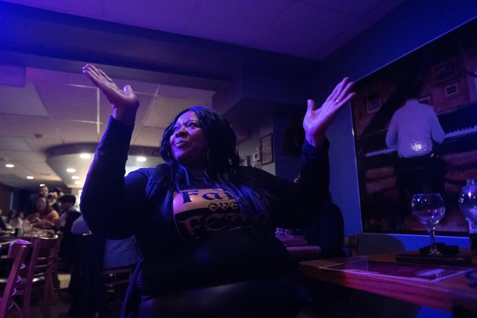 Sonya Mingo of Trenton applauds during the live performance at Rosetta's Jazz Cafe in Morrisville on Friday, Feb. 10, 2023. 