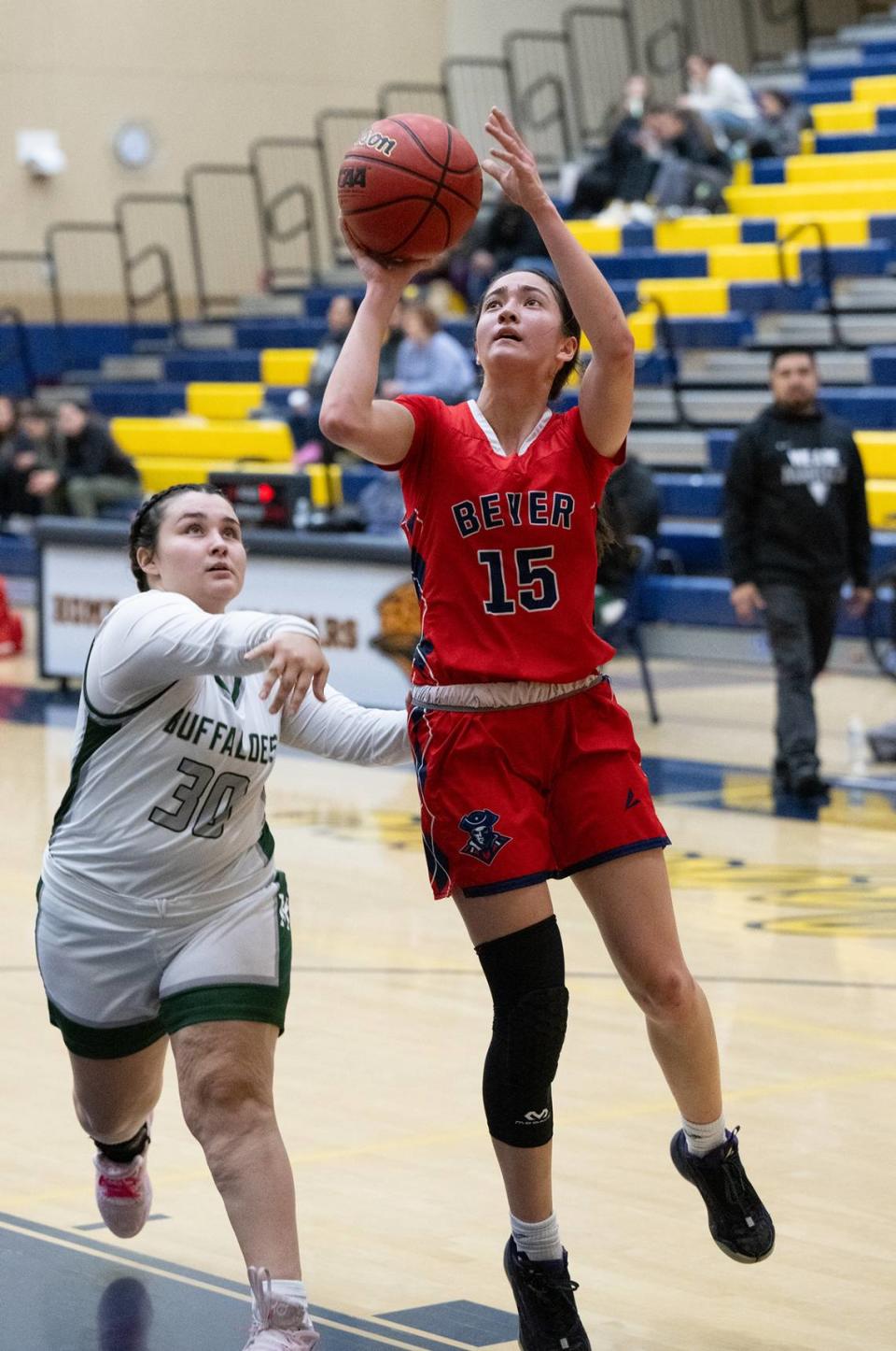 Beyer’s Kylie Kulina scores on a layup past Manteca’s Brea Vieira during the tournament game at Gregori High School in Modesto, Calif., Friday, Dec. 8, 2023.