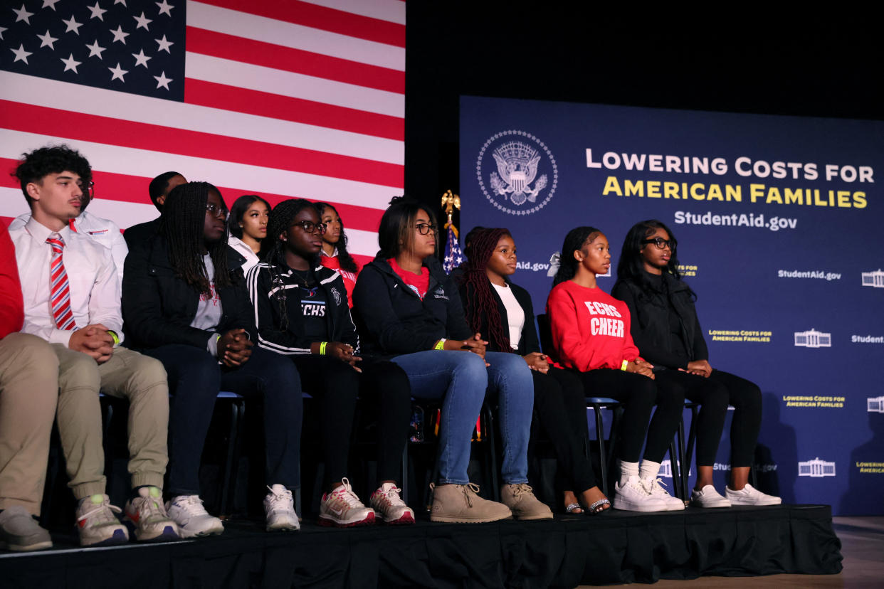 Students listen as U.S. President Joe Biden delivers remarks about student debt relief at Delaware State University in Dover, Delaware, U.S., October 21, 2022. REUTERS/Leah Millis