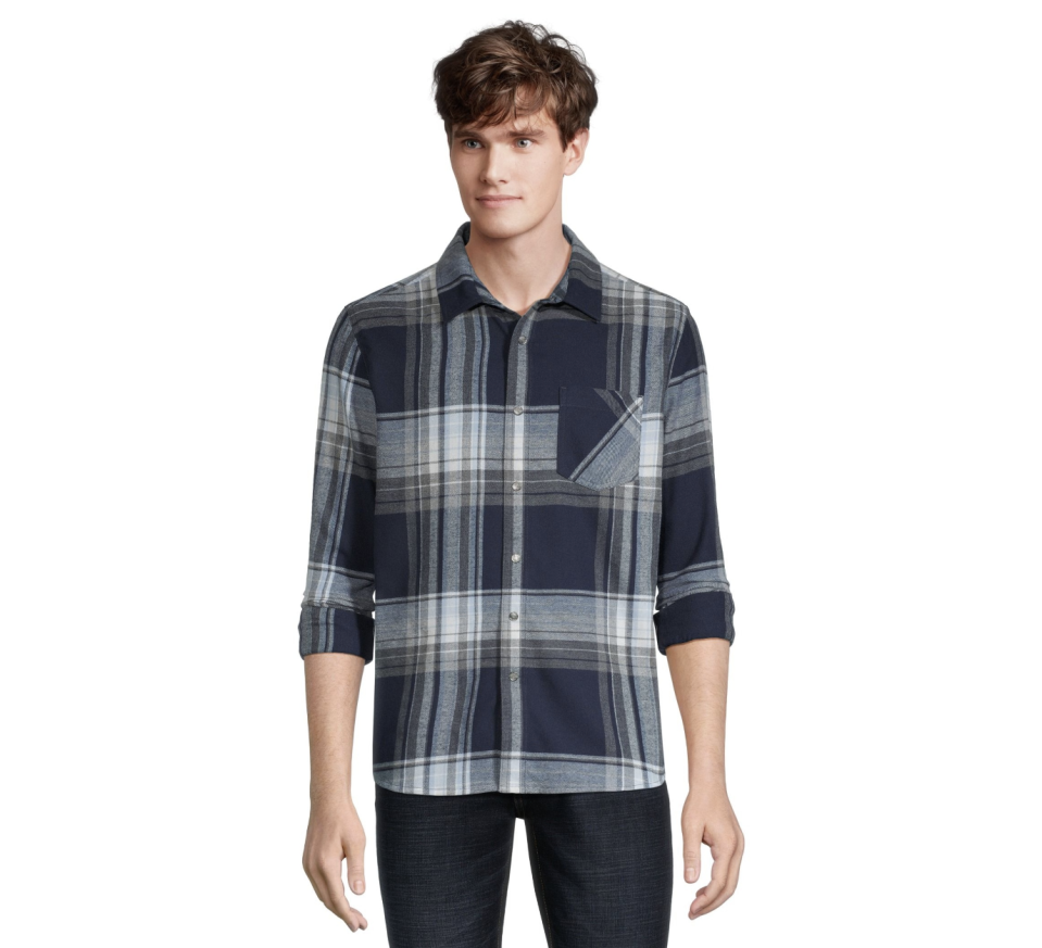 model wears grey and white Boston Traders Men's Double Brushed Long Sleeve Snap Flannel Shirt