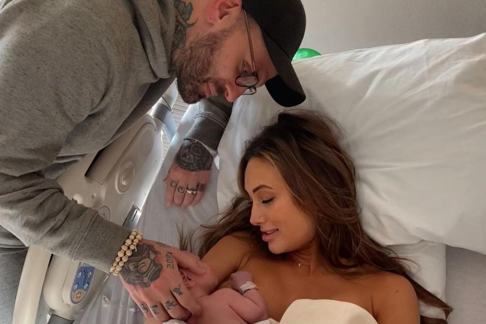 <p>Leah Van Dale/Instagram</p> Corey Graves and Carmella welcome baby boy