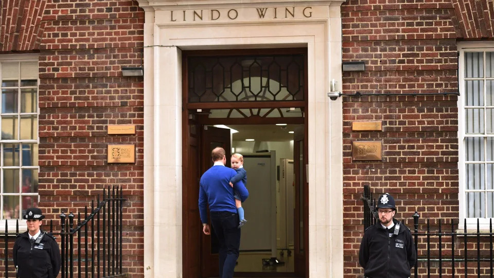 Prince William carried Prince George into the Lindo Wing where his wife gave birth to Princess Charlotte in 2015