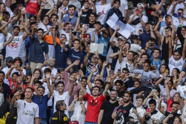 Hazard takes a snapshot with  his phone in front of 50,000 Real Madrid fans at the Bernabeu 