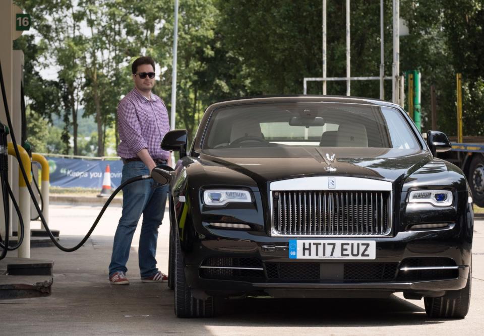 Ed Wiseman filling up the Rolls Royce Dawn at South Mimms services