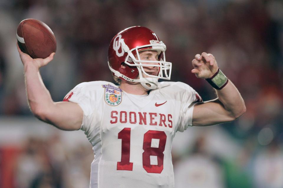 2003: Jason White
Jason White and Oklahoma met LSU in the Sugar Bowl for the BCS championship. LSU's top-ranked defense held the country's most prolific offense, which had averaged 45.2 points and 461 yards per game, to 154 total yards and one touchdown until midway through the fourth quarter in the Tigers' 21-14 victory. White completed 13-of-37 passing attempts for just 102 yards. He was also sacked seven times and intercepted twice.
Mandatory Credit: Photo by Preston Mack-USA TODAY Sports (©) Copyright 2005 by Preston Mack