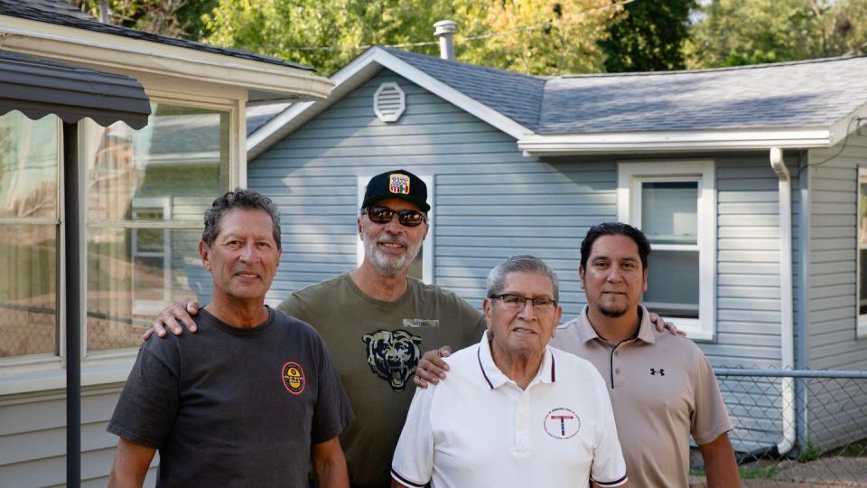 Frank Pompa (center right) is joined by his nephews and sons (left to right) Ken Knox, Dan Knox and Tony Pompa, his fallen brother's namesake and an Army veteran. (Zamone Perez/Staff)