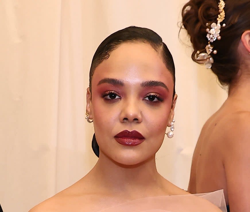 Tessa Thompson wearing matching eye and lip makeup