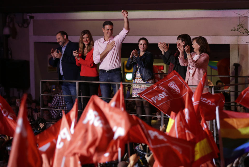 Spanish Prime Minister and Socialist Party candidate Pedro Sanchez gestures to supporters gathered at the party headquarters waiting for results of the general election in Madrid, Sunday, April 28, 2019. Spain's governing Socialists won the country's national election Sunday but will need the backing of smaller parties to stay in power, while a far-right party rode a groundswell of support to enter the lower house of parliament for the first time in four decades, provisional results showed. (AP Photo/Andrea Comas)