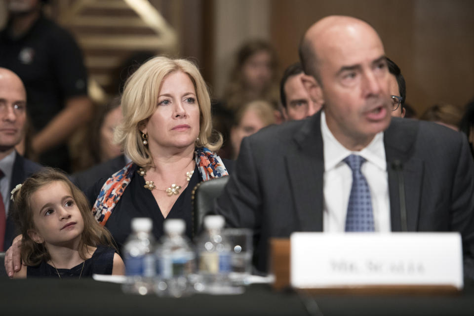 Secretary of Labor nominee Eugene Scalia testifies as his wife Patricia, and daughter Isabella, watch during his appearance before the Senate Committee on Health, Education Labor and Pensions' Hearing on his nomination, on Capitol Hill, in Washington, Thursday, Sept. 19, 2019. (AP Photo/Cliff Owen)