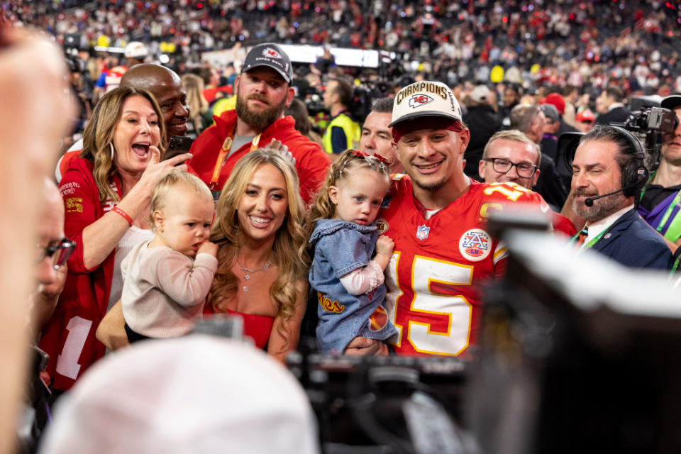 LAS VEGAS, NEVADA - FEBRUARY 11: Patrick Mahomes #15 of the Kansas City Chiefs, Brittany Mahomes and their two kids pose following the NFL Super Bowl 58 football game between the San Francisco 49ers and the Kansas City Chiefs at Allegiant Stadium on February 11, 2024 in Las Vegas, Nevada. (Photo by Michael Owens/Getty Images)