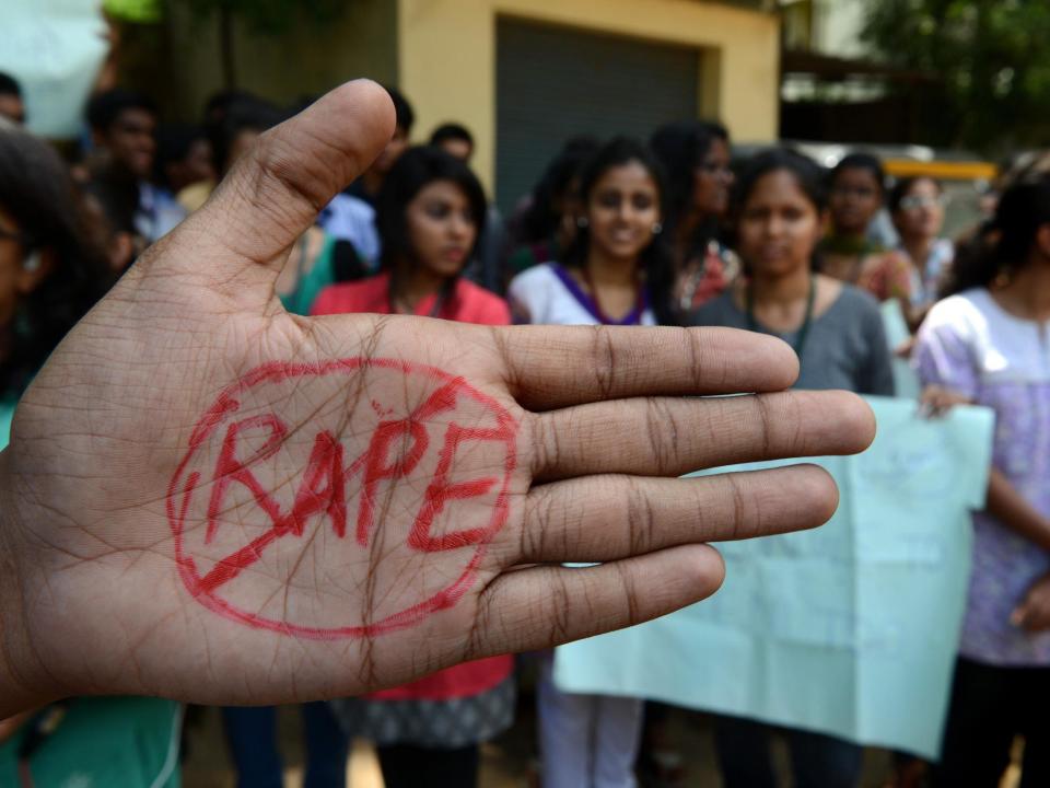 Two women have been beaten up and had their heads shaved by a mob of men in India after they resisted an attempted gang rape, police said.Several men, including a local government official, barged into the home of the mother and her daughter with the intent of raping the teenager, police in northeastern Bihar said.“When the mother and daughter protested, the men got angry and called a local barber, who shaved their heads,” senior officer Sanjay Kumar told the Thomson Reuters Foundation.The men then assaulted the mother and daughter with sticks, before parading them around the village before neighbours protested against their treatment.“We have arrested two men and are searching for the other five,” Mr Kumar said, adding that the criminal investigation was ongoing.Describing the attack, the mother told NDTV: ”We have been beaten very badly. I have injuries all over my body and my daughter too has some injuries.”Her daughter told the broadcaster: "I was alone with my mother around 6.30 in the evening when five men from the neighbourhood forcefully entered the house and tried to molest me.“When my mother and I protested, they started beating us with a stick and took us outside of the house.”India has a poor record on sexual violence against women, despite legal reforms following the gang rape of a student on a bus in Delhi in December 2012.Nearly 40,000 rapes were registered in India in 2016 – an average of about 100 cases each day - according to the latest government data.Earlier this week, a man in the northern state of Uttar Pradesh ran over and killed two women with his car after they protested against his attempt to molest one of their daughters.Four men attacked a girl with acid in Bihar in April after she tried to fight off their gang rape attempt.In 2014, village elders in Bihar shaved the head of an orphan girl, blackened her face with ash, and paraded her through their neighbourhood as punishment for talking to her boyfriend in a public place.Additional reporting by the Thomoson Reuters Foundation