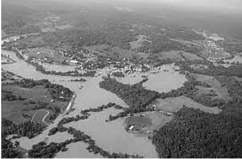 This U.S. Geological Survey photograph shows the extent of the flooding through which Annette Mills and her family traveled in 1998.