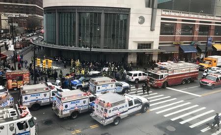 Emergency vehicles gather at the Atlantic Avenue Terminal after a commuter train derailed during the Wednesday morning commute, in New York, U.S., January 4, 2017. REUTERS/Jonathan Oatis